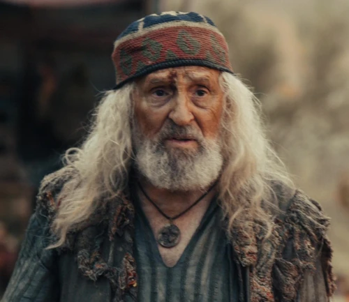 Older Adan portrayed by Peter Gilchrist