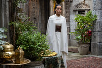 Nynaeve in novice white on the streets of Tar Valon