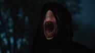 Episode 102: A Fade with its mouth wide open, showing rows of needle teeth