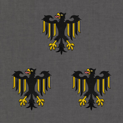 Three black eagles on a background of gray