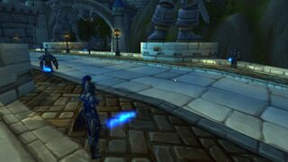 Stormwind City Guards wielding blue lightsabers