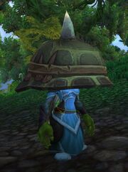 A female goblin priest, disguised with the Dark Tan Helmet.