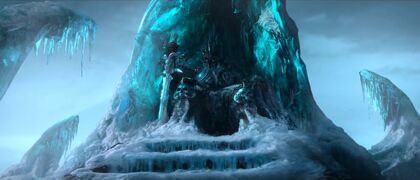 Lich King Arthas with Frostmourne frozen in the throne.
