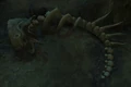 An easter egg found at [46.2, 36.4] east of the Seat of Command. The two skeletons resemble a zerg and a terran from Starcraft.