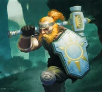 A dwarf with a shaven chin in the TCG.