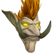 Rostro del trol de arena con ojos dorados.