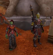 Shuja and Breka Grimaxe beside the inn.