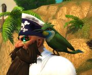 Petey riding on a player's shoulder.