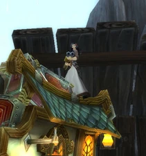 Lorna riding shotgun on the carriage leaving Greymane Manor[28.2, 50]