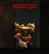 He will at first be disguised as a Scarshield Infiltrator, but will reveal himself as a human once you approach.