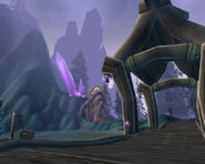 The rear entrance of the Exodar as seen from the dock of Valaar's Berth, which grants boat travel to Auberdine.