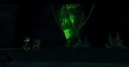 Gul'dan and a traitor warden approach the remains of Illidan.