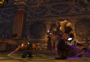 Dwarf warrior fighting a vrykul in Utgarde Keep.