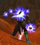 Troll Shaman casting a Lightning Shield.