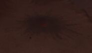 A smoldering crater in the heart of the Tainted Scar.