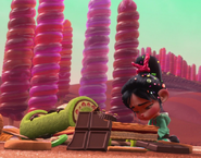 Vanellope with the remains of the Likkity-Split.