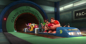 Bowser boarding the Pac-Manorail to Game Central Station