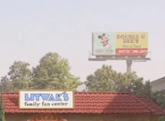Mickey Mouse (Hidden Mickey) (on a "Double U Dee's" (WD's) billboard).