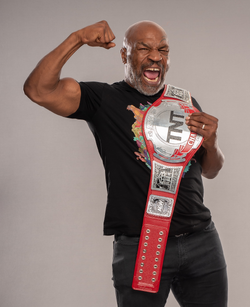 Mike Tyson With TNT Championship.png