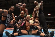 Several members of Bullet Club celebrating a victory in 2014.