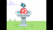 169 Bird On Ball In Bird Bath