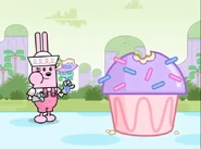 Widget eating a giant cupcake