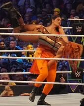 480px-Kavita Devi wrestling Becky Lynch at WrestleMania 34