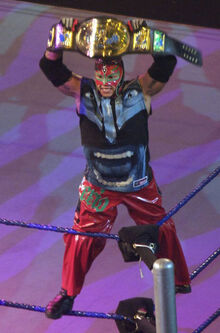 396px-Rey Mysterio raises IC title