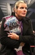 Jeff Hardy como TNA World Heavyweight Champion, con el Inmortal Belt.