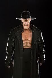 The Undertaker tattoos What is the scoop behind each Taker tattoo