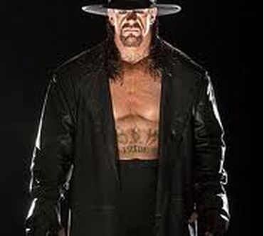 WWE's Undertaker talks Cowboys, Longhorns fandom; what it meant to