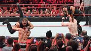 Ambrose and Rollins launches themself onto Sheamus and Cesaro