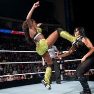 Naomi kick to Aksana