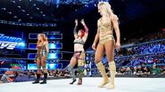 Asuka Becky Lynch and Charlotte Flair