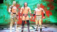 Neville teaming with the Lucha Dragons