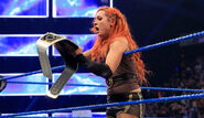 Becky winning the SmackDown Women's Champion