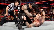 Reigns attacking Orton