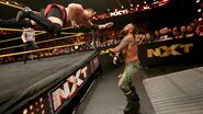 Joe diving onto Eric Young