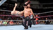 Styles punches Cesaro