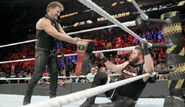 Chris Jericho-hands-title-to-Kevin Owens