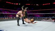 Neville hits Dorado with a powerbomb