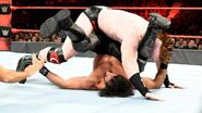 Rollins in roll up pin by Sheamus