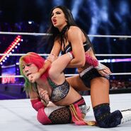 Billie locking in Asuka