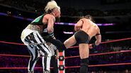 Amore hit with another punishing kick by Neville