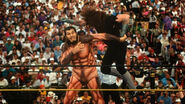 Undertaker attacking González.