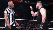 Owens talkin' to Shane McMahon