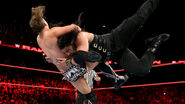 The Miz speared by Reigns