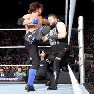 AJ Styles battles Kevin Owens