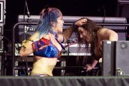 Asuka and Nikki Cross battling off.