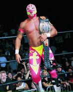 Rey Mysterio holding the WCW Cruiserweight Champion
